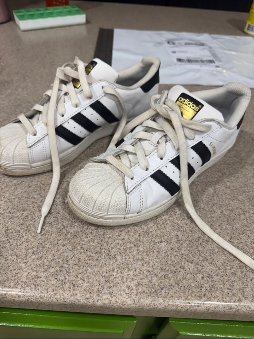 adidas Kids White Sneakers with Black Stripes and Gold Logo